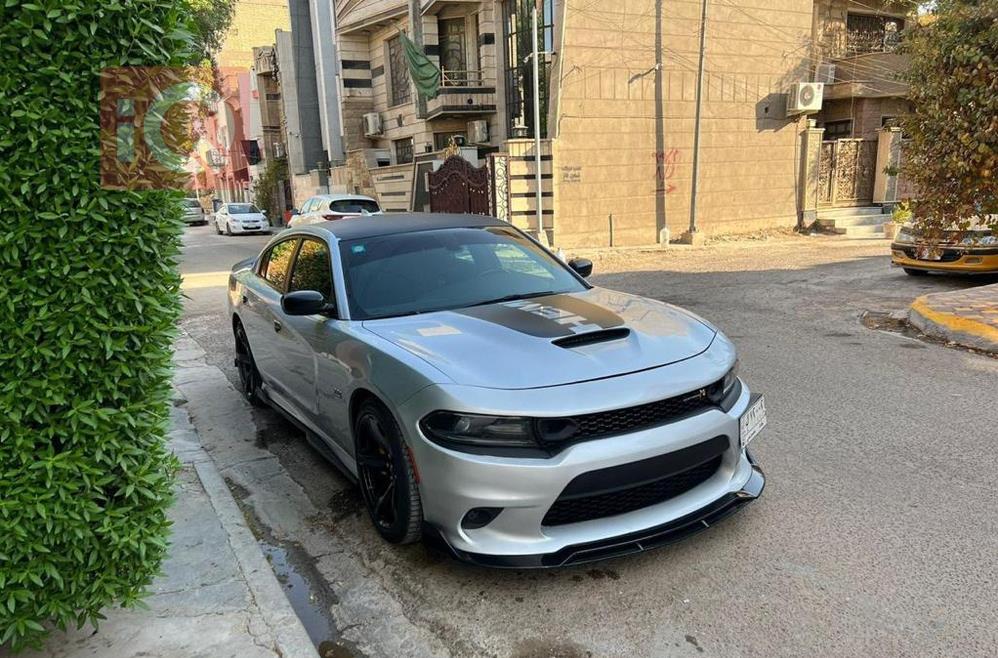 دۆج چارجەر